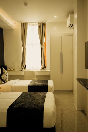 Imagen de la habitación del Hotel Madayaw Tagum. Foto 8