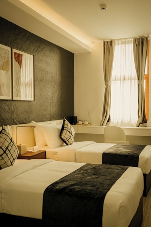 Imagen de la habitación del Hotel Madayaw Tagum. Foto 10