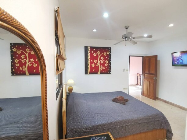 Imagen de la habitación del Hotel Madee Villa - Pattaya Holiday House Walking Street. Foto 19