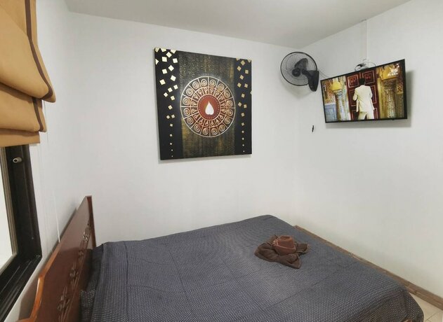 Imagen de la habitación del Hotel Madee Villa - Pattaya Holiday House Walking Street. Foto 22