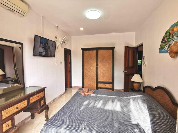 Imagen de la habitación del Hotel Madee Villa - Pattaya Holiday House Walking Street. Foto 27
