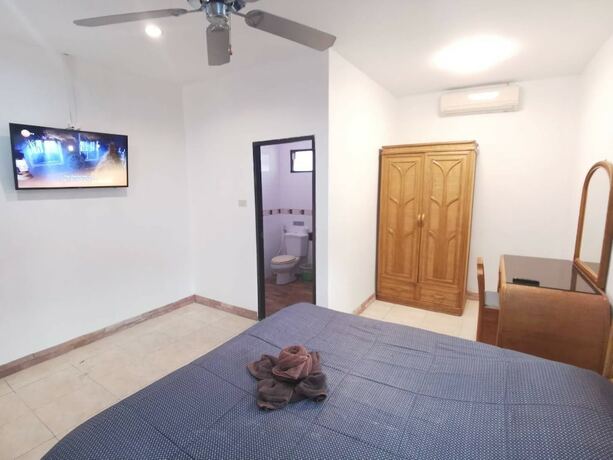 Imagen de la habitación del Hotel Madee Villa - Pattaya Holiday House Walking Street. Foto 29