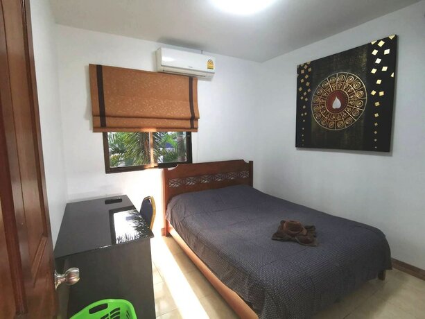 Imagen de la habitación del Hotel Madee Villa - Pattaya Holiday House Walking Street. Foto 35