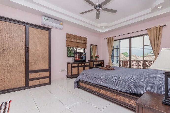 Imagen de la habitación del Hotel Madee Villa - Pattaya Holiday House Walking Street. Foto 36