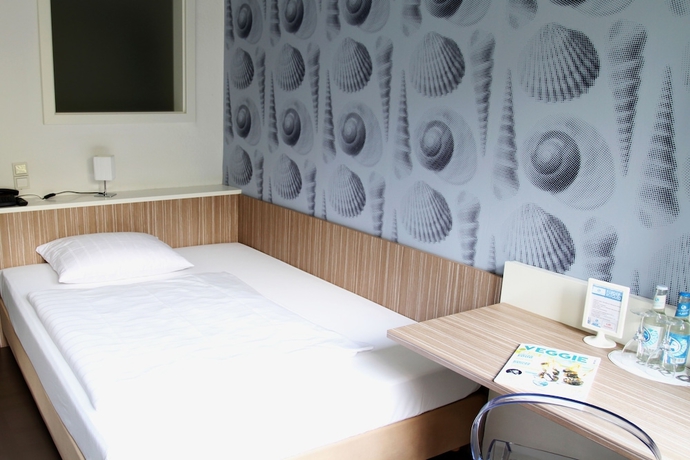 Imagen de la habitación del Hotel Madeleine. Foto 13