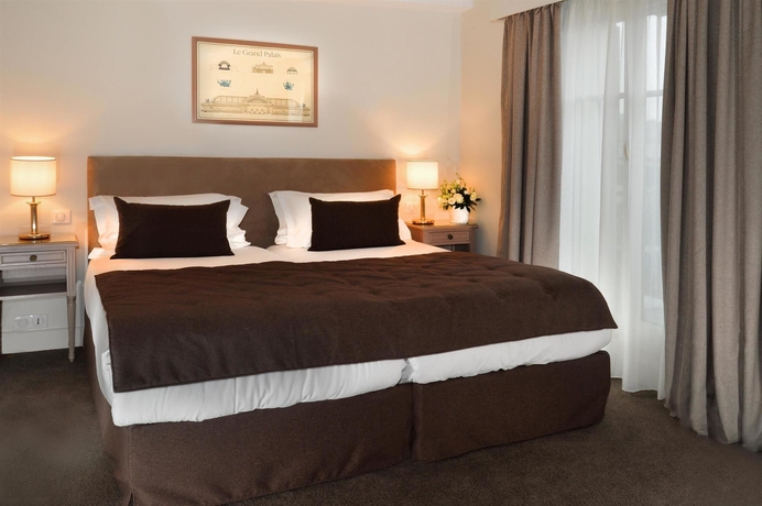 Imagen de la habitación del Hotel Madeleine Plaza. Foto 3