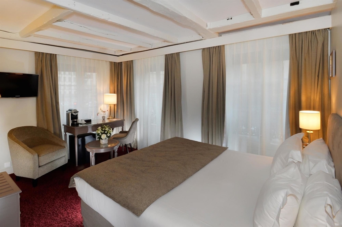 Imagen de la habitación del Hotel Madeleine Plaza. Foto 7