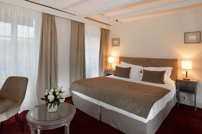 Imagen de la habitación del Hotel Madeleine Plaza. Foto 9