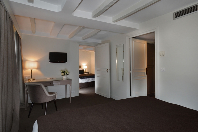 Imagen de la habitación del Hotel Madeleine Plaza. Foto 12