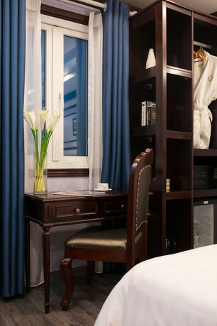 Imagen de la habitación del Hotel Madelise Central & Travel. Foto 14