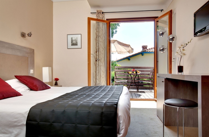 Imagen de la habitación del Hotel Madeloc. Foto 10