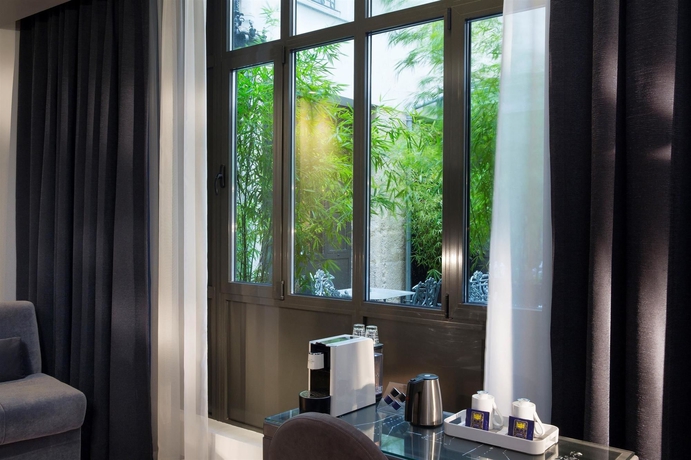 Imagen de la habitación del Hotel Mademoiselle, Gare du Nord. Foto 10