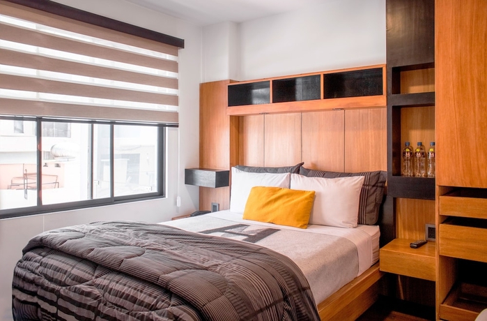 Imagen de la habitación del Hotel Madero and Suites. Foto 6