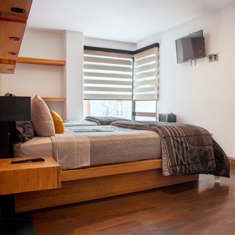 Imagen de la habitación del Hotel Madero and Suites. Foto 12