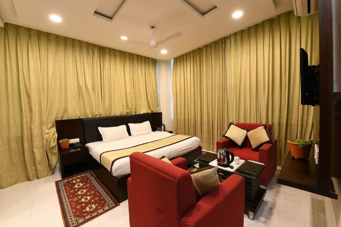 Imagen de la habitación del Hotel Madhav Muskan Residency. Foto 19