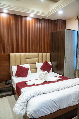Imagen de la habitación del Hotel Madhav Palace. Foto 9