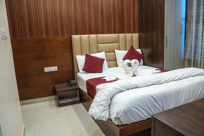 Imagen de la habitación del Hotel Madhav Palace. Foto 10