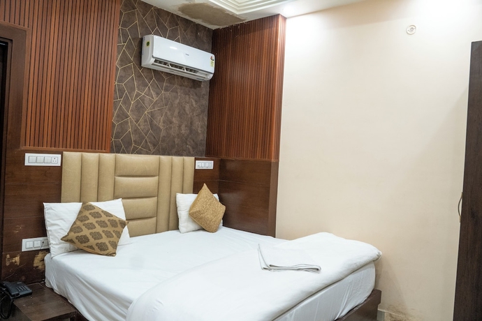 Imagen de la habitación del Hotel Madhav Palace. Foto 11