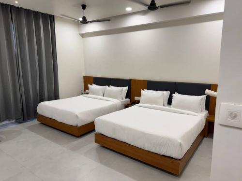Imagen de la habitación del Hotel Madhukta Inn. Foto 20