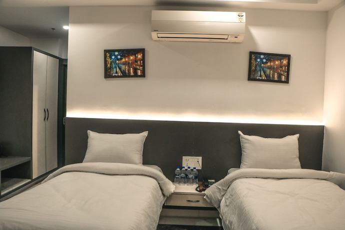 Imagen de la habitación del Hotel Madhushree. Foto 13