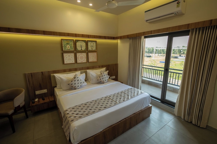 Imagen de la habitación del Hotel Madhuvan Resort. Foto 13