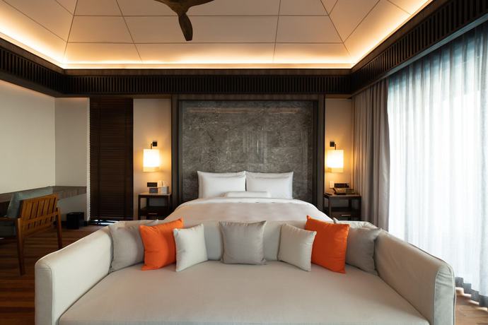 Imagen de la habitación del Hotel Madifushi Private Island. Foto 5