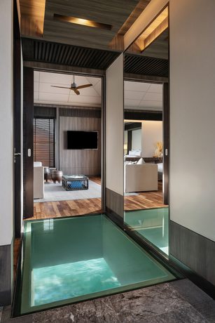 Imagen de la habitación del Hotel Madifushi Private Island. Foto 9