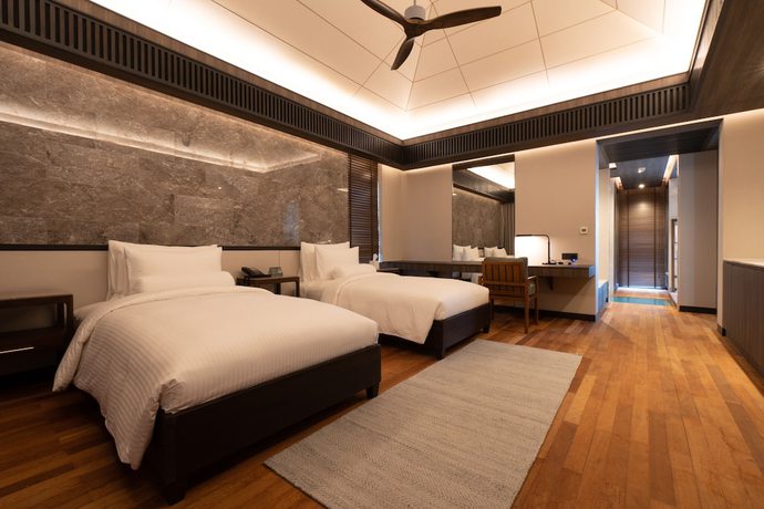 Imagen de la habitación del Hotel Madifushi Private Island. Foto 11