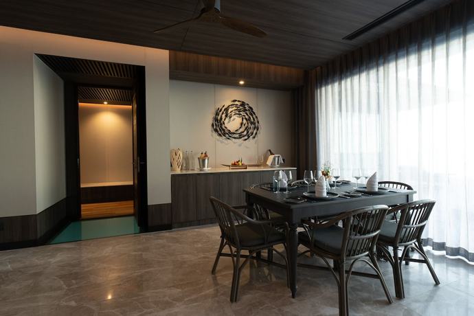 Imagen de la habitación del Hotel Madifushi Private Island. Foto 17