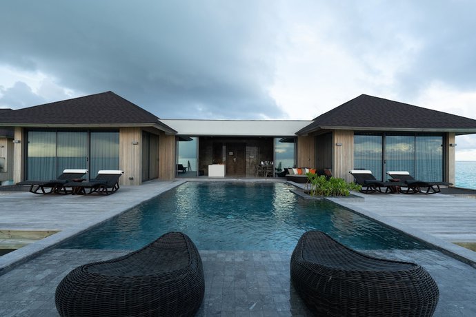 Imagen de la habitación del Hotel Madifushi Private Island. Foto 19