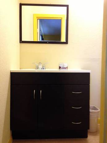 Imagen de la habitación del Hotel Madill Inn. Foto 7