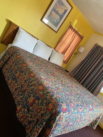 Imagen de la habitación del Hotel Madill Inn. Foto 18