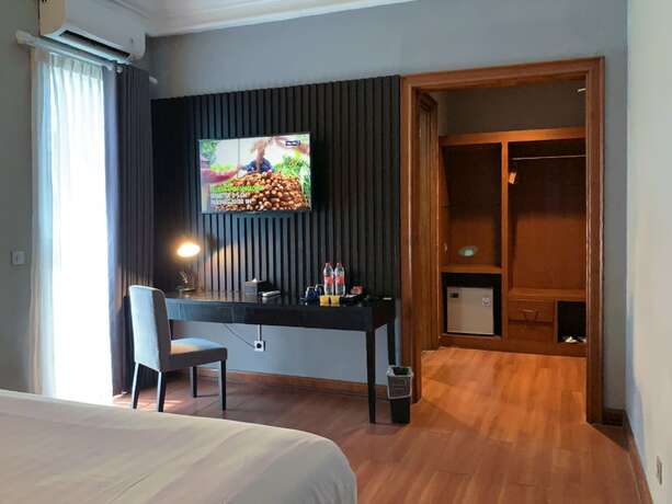 Imagen de la habitación del Hotel Madina Inn. Foto 13