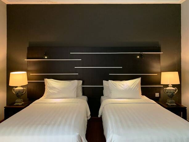 Imagen de la habitación del Hotel Madina Inn. Foto 17
