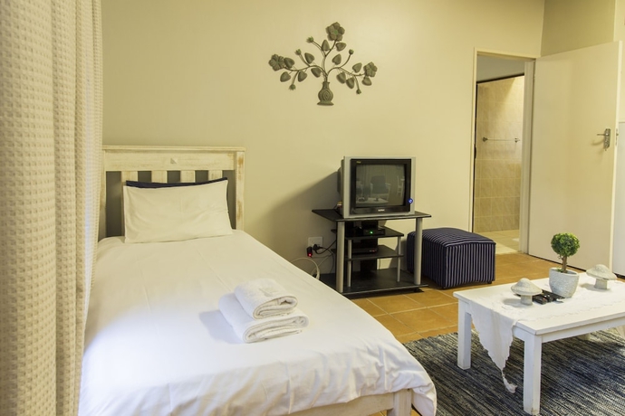 Imagen de la habitación del Hotel Madiolyn. Foto 15