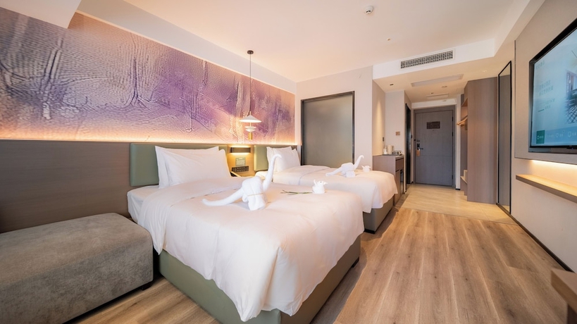 Imagen de la habitación del Hotel Madison Haikou Qilou Old Street. Foto 3
