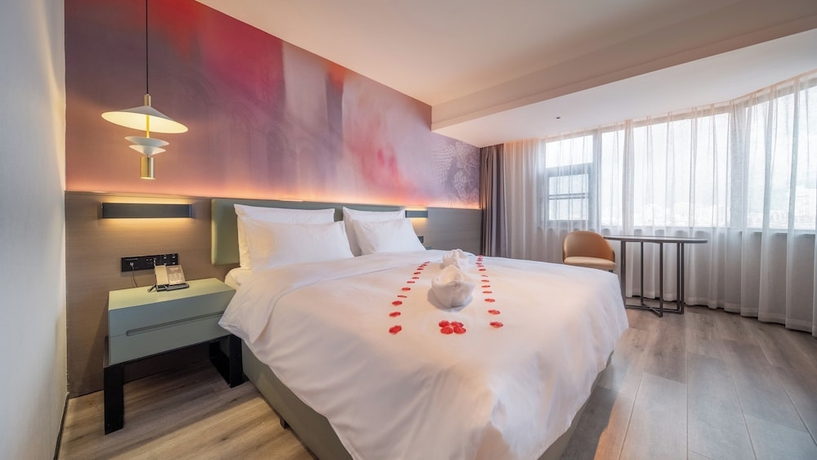 Imagen de la habitación del Hotel Madison Haikou Qilou Old Street. Foto 4