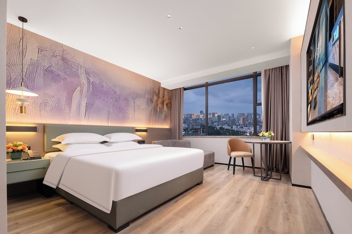 Imagen de la habitación del Hotel Madison Haikou Qilou Old Street. Foto 5