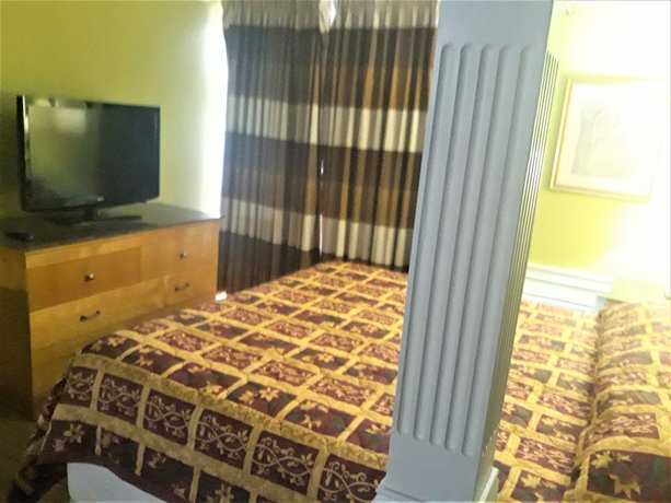 Imagen de la habitación del Hotel Madison Inn And Suites. Foto 9