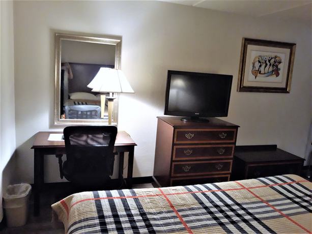 Imagen de la habitación del Hotel Madison Inn And Suites. Foto 12