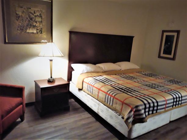 Imagen de la habitación del Hotel Madison Inn And Suites. Foto 13
