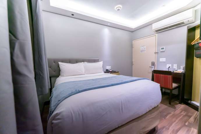 Imagen de la habitación del Hotel Madison LES. Foto 8