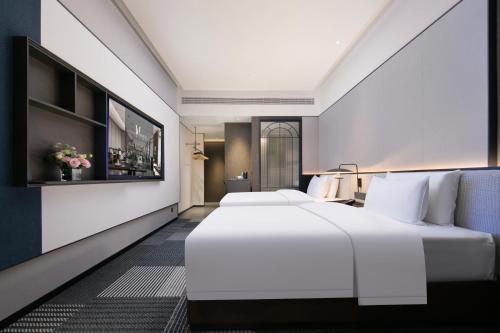 Imagen general del Hotel Madison Wuhan Jianghan Road Pedestrian Street. Foto 5