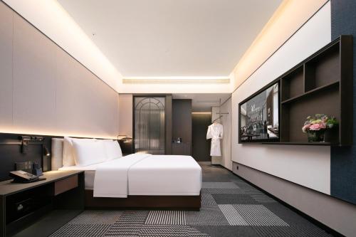 Imagen general del Hotel Madison Wuhan Jianghan Road Pedestrian Street. Foto 10
