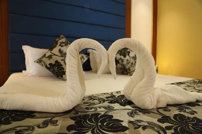 Imagen de la habitación del Hotel Madni Royale. Foto 4
