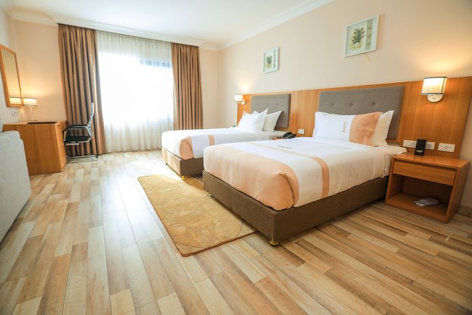 Imagen de la habitación del Hotel Mado. Foto 8