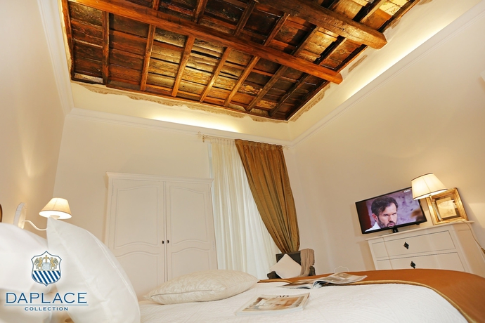 Imagen de la habitación del Hotel Madonna De' Monti Suites. Foto 6