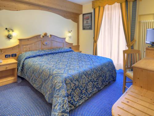 Imagen de la habitación del Hotel Madonna Delle Nevi. Foto 1