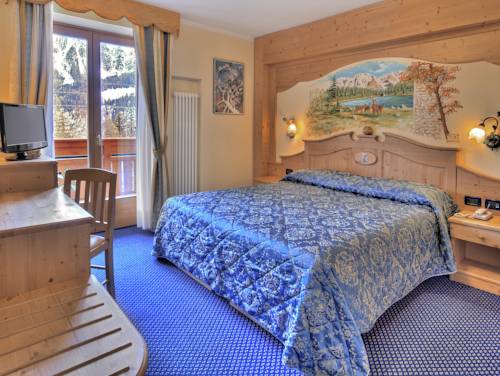 Imagen de la habitación del Hotel Madonna Delle Nevi. Foto 2