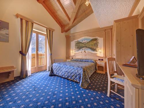 Imagen de la habitación del Hotel Madonna Delle Nevi. Foto 4